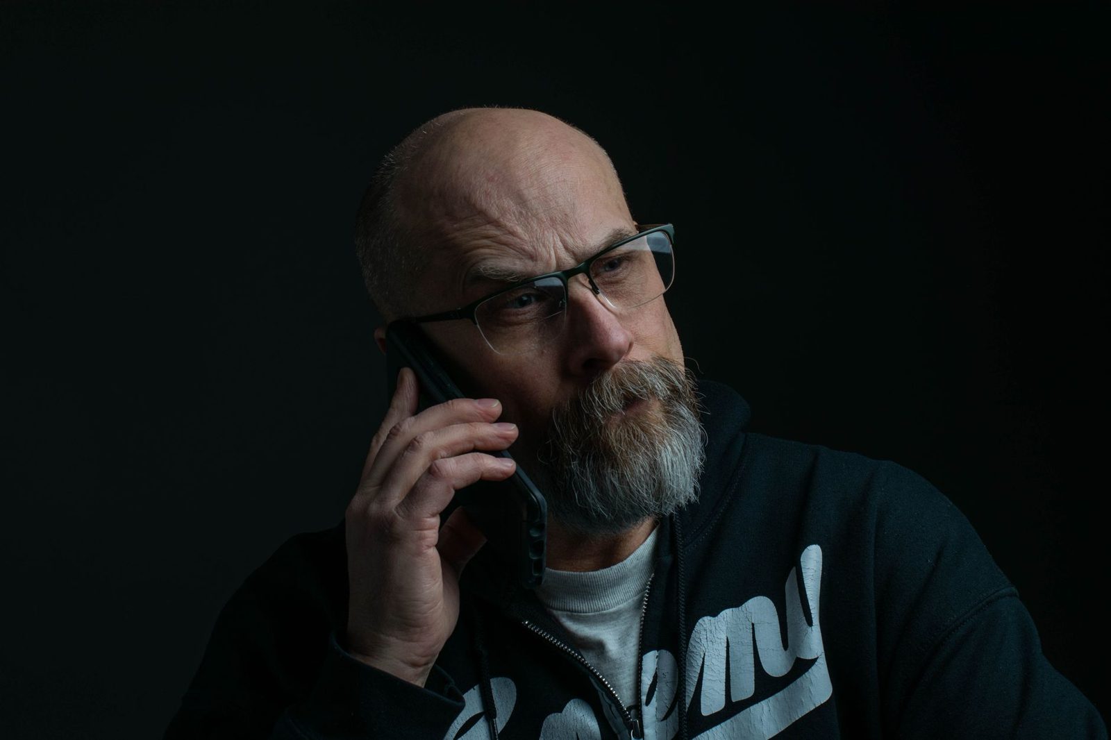 Man on a phone call looking worried